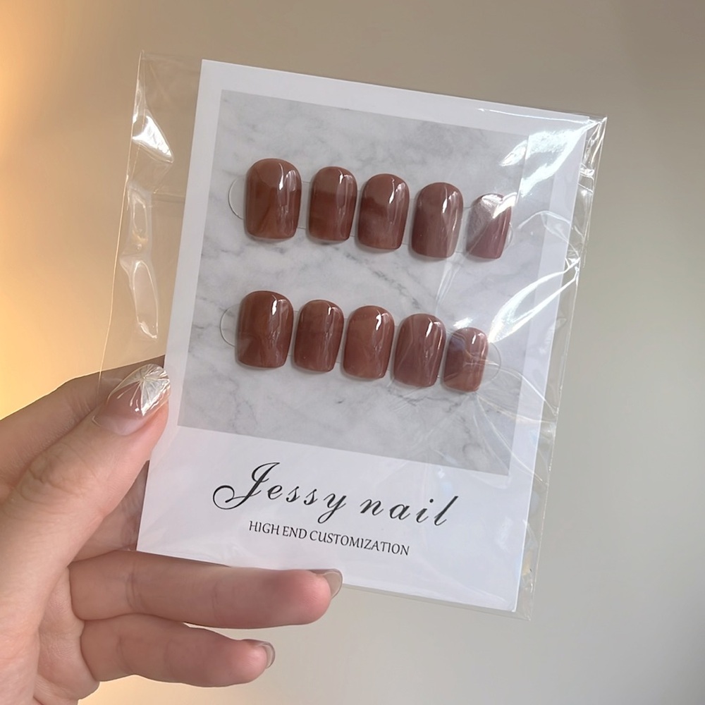 Brand new press on nails in coral-burgundy